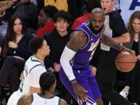 九游-关于詹姆斯连续二十场比赛得分超过战术调整，雄鹿挑战极限！的信息